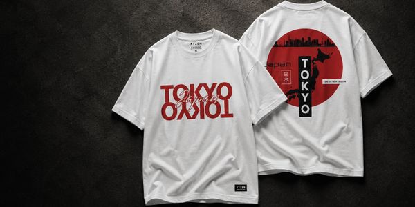 White T-shirts featuring bold Tokyo and Japan designs in red and black.