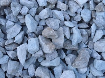 This all natural limestone product has been crushed to 1/2". This is a whitish-grey colored stone.