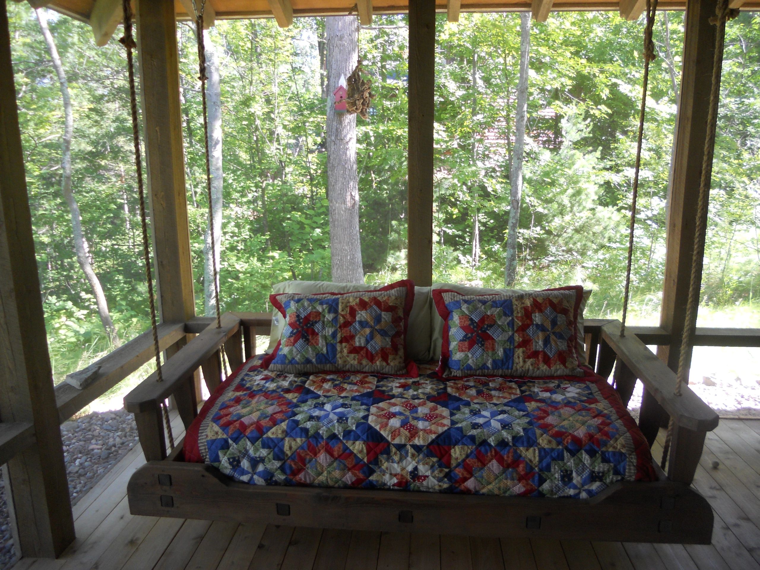 Hanging SwingBed on a screened-in porch