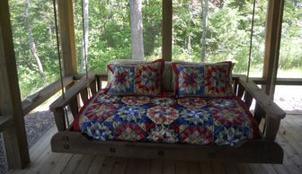 hanging Swingbed in screened in porch with ropes