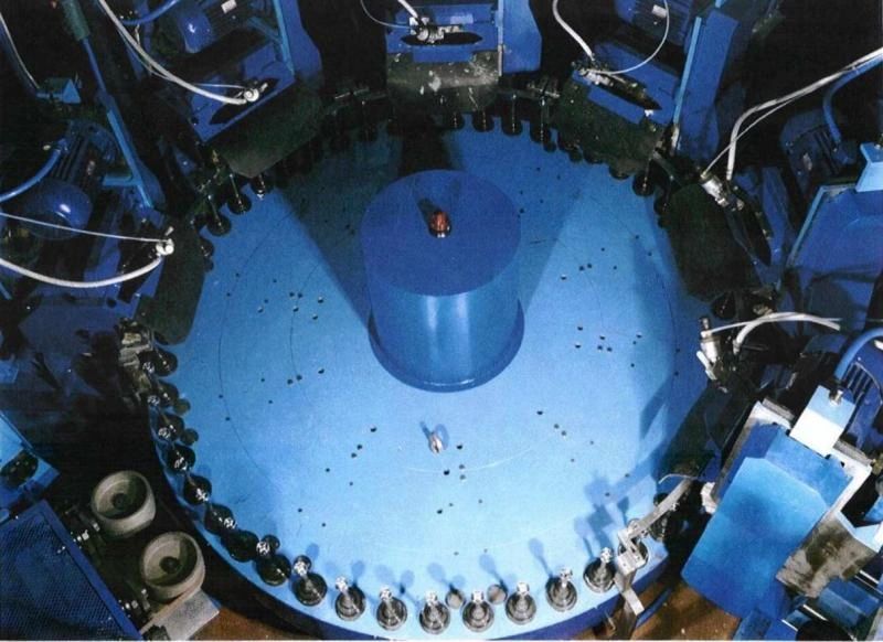Rotary polishing machine for high volume brass levers, knobs, caps, handles mirror finishing