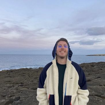 man in the beach smiling