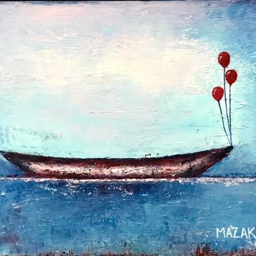 Boat floating with red balloons in calm blue waters.