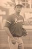 A vintage photo of a baseball player in uniform.