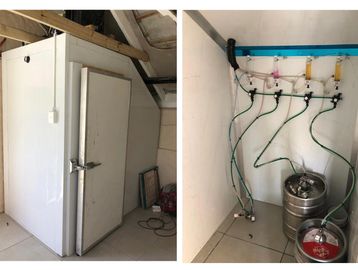 Cold room installation with beer kegs and fobs.