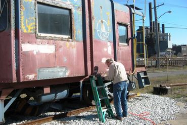 The wagon top B&O caboose by the Midwest entrance the last time it received a fresh coat of paint.
