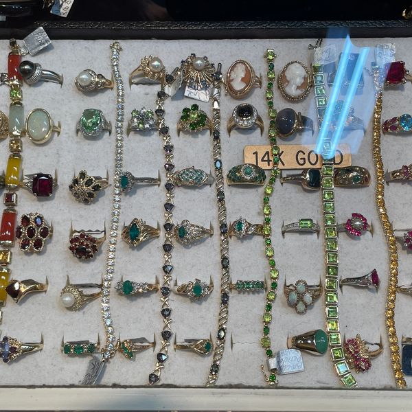 Variety of gemstone rings displayed at Oscar’s Estate Jewelry.