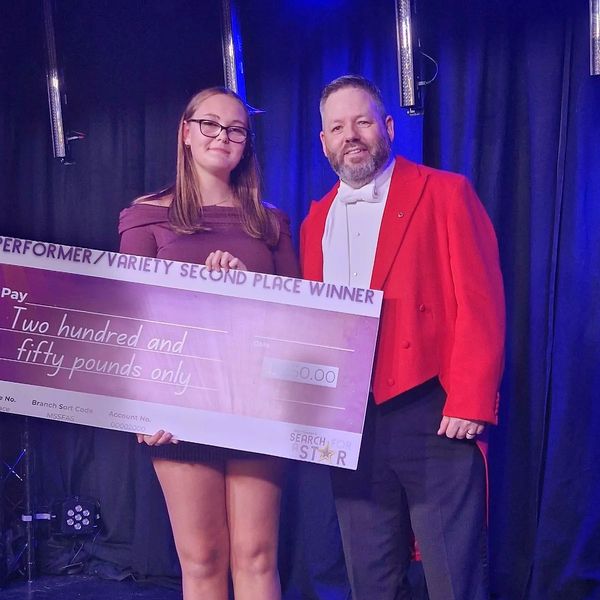 Assisting with presenting awards at Mid Sussex Search for a Star competition.