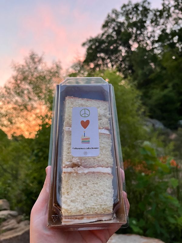 Packaged “white on white” cake slice at Weekend at the Cave 