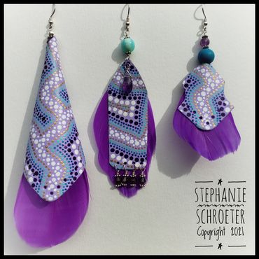 Leather and feather earrings. Sterling Silver, leather, amethyst, Peruvian opal. garnets.