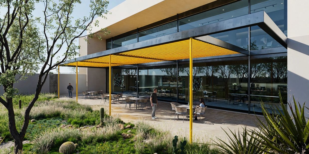 Modern outdoor patio with yellow pergola and glass building facade.