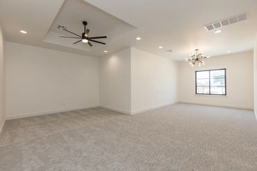 Game room with two areas in home for sale in Oak Tree, Edmond, OK.