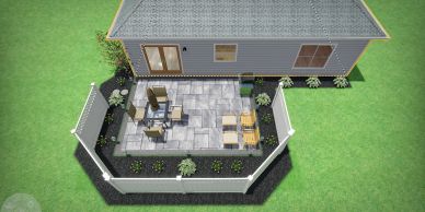 Backyard patio with seating and garden beds.
