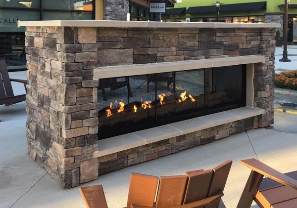 Stone gas fireplace, cultured stone fireplace, outdoor fireplace, stone fireplace, patio fireplace.