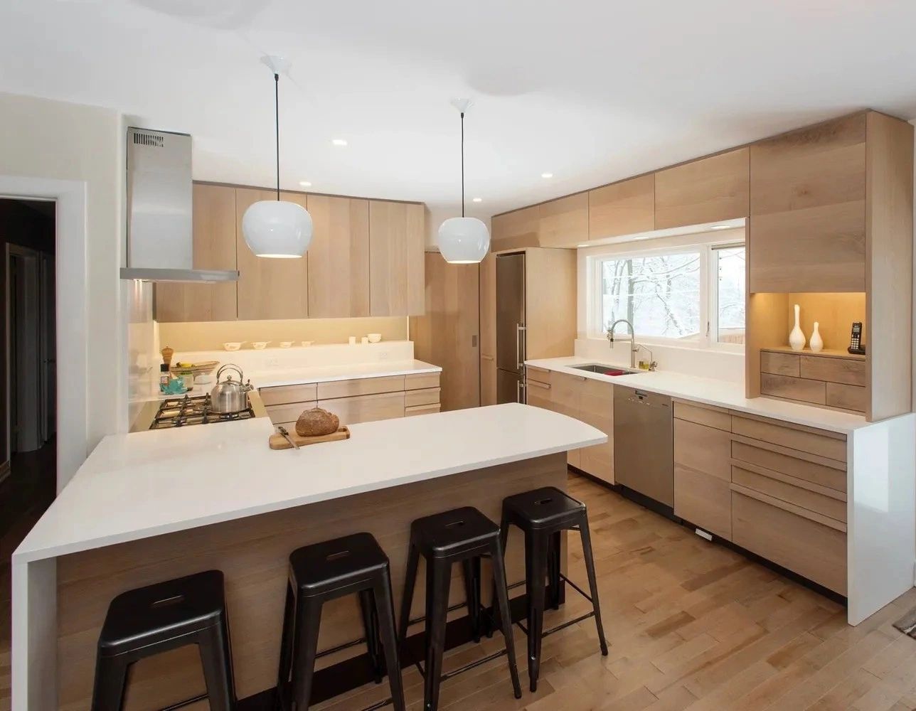 White quartz countertops installed in a modern kitchen setting in Guelph Ontario.
