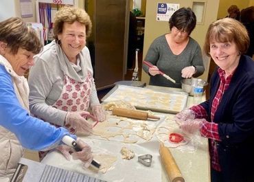 Volunteers baking for those in need 