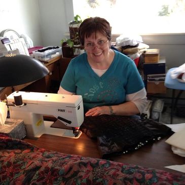 Janice Roper at her sewing machine.