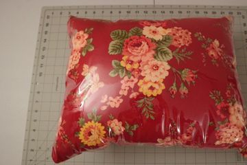 Pillows are encased in clear vinyl so they can be sanitized after use 