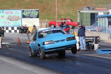 Wheels up racing mustang drag race