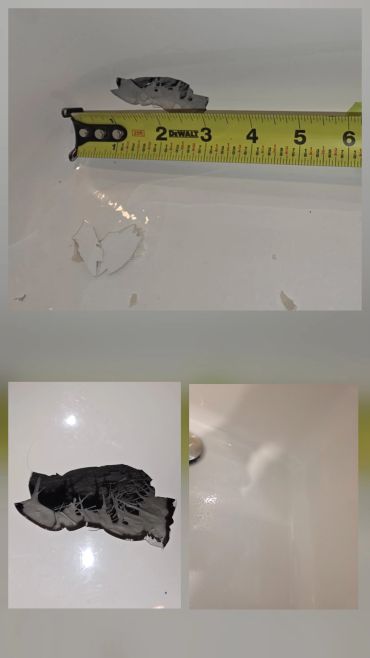 Measuring torn bathtub surface with peeling and chipped paint.