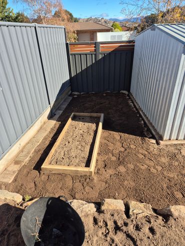 Small garden bed install for a grass bed in a chicken pen.