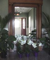 foyer with pier mirror decorated for Spring