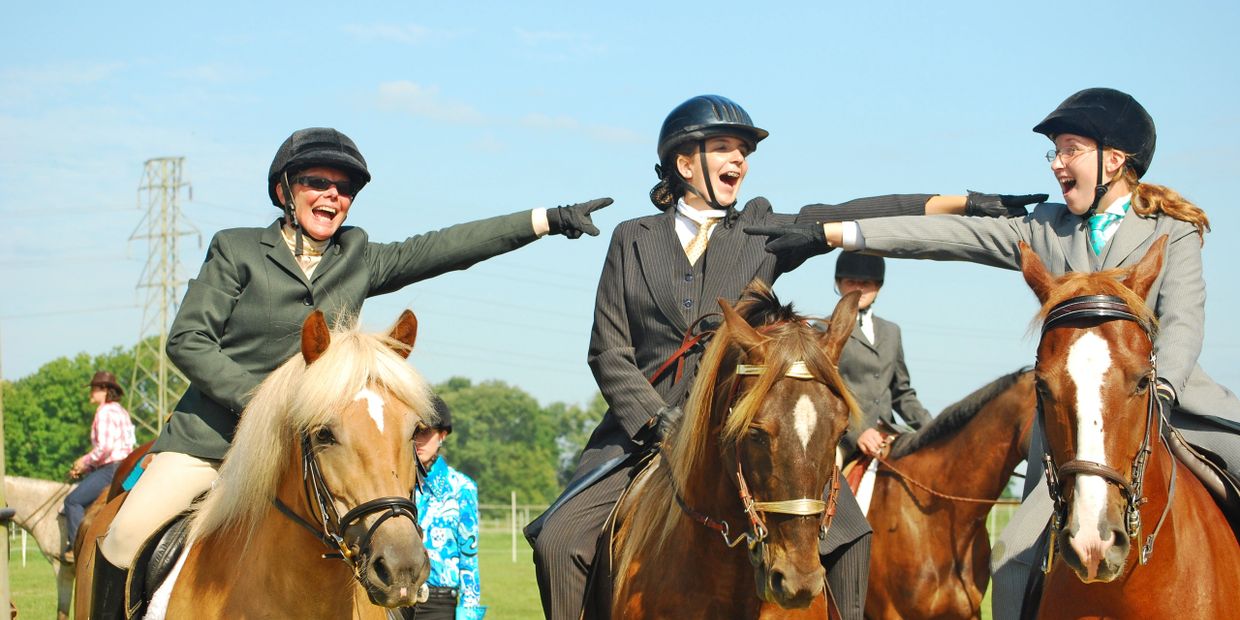 Horse riders of all ages compete during Field Day.