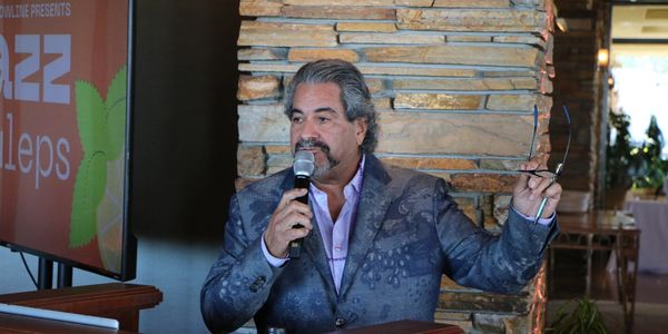 Live auctioneer leading fundraising event with A&A Event Production