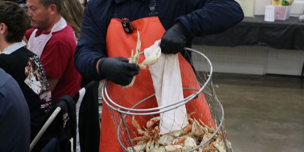 Crab feed catering service with tables, linens, and service staff from A&A Event Production