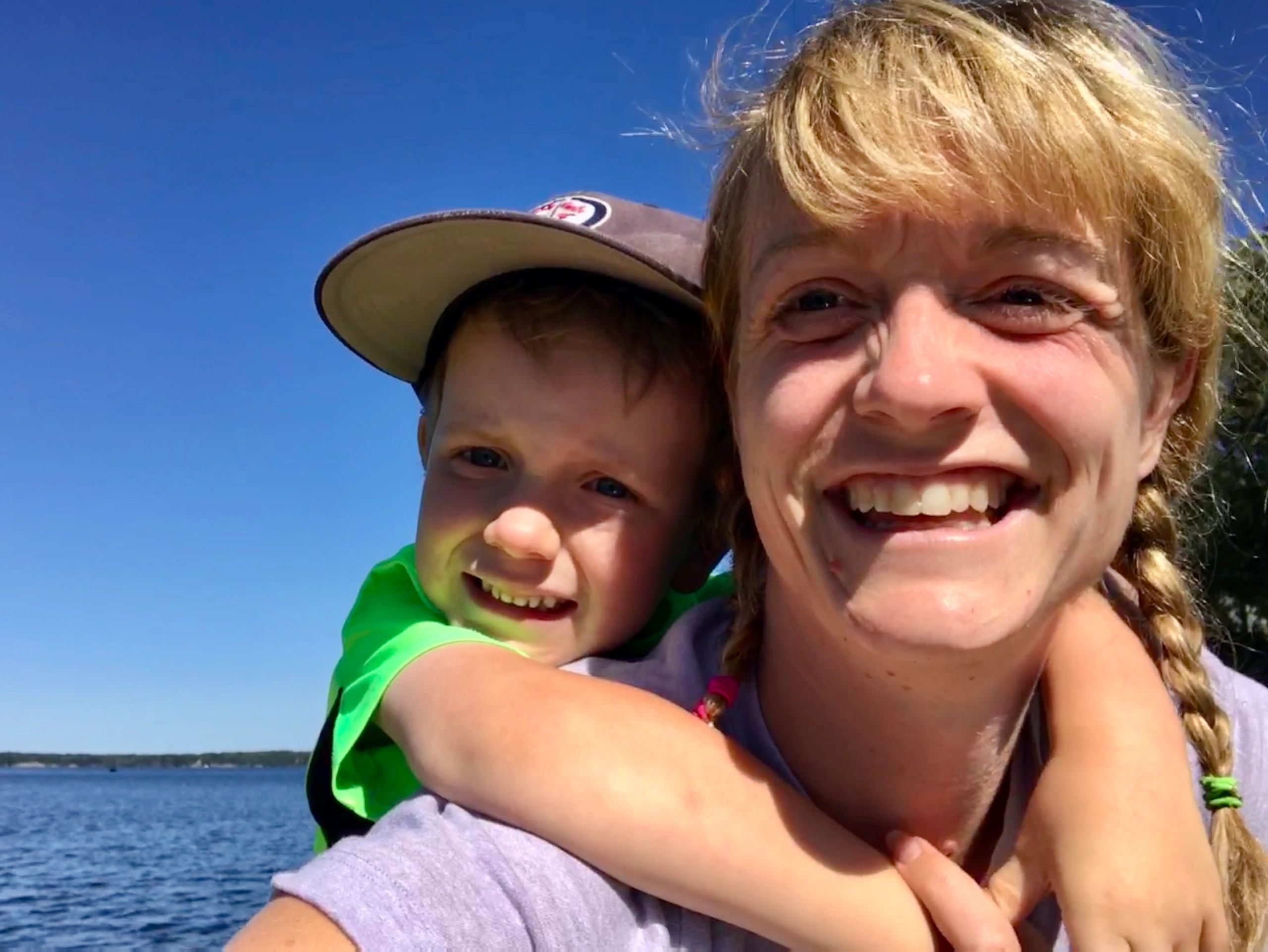 A photo of Jillian Enright, neurodiversity advocate and writer, with her son at the cottage. 