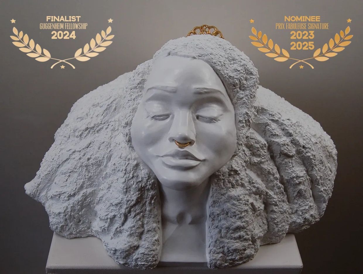 Sculpted female bust with awards text overlays.