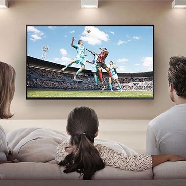  A family enjoying their TV time