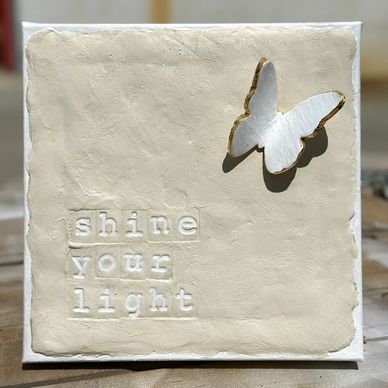 Clay on canvas wall art with custom inspiring messages, and handmade clay butterflies
