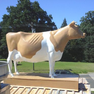 Historic painting restoration Pine State Creamery cow Taqueria La Vaquita Durham North Carolina