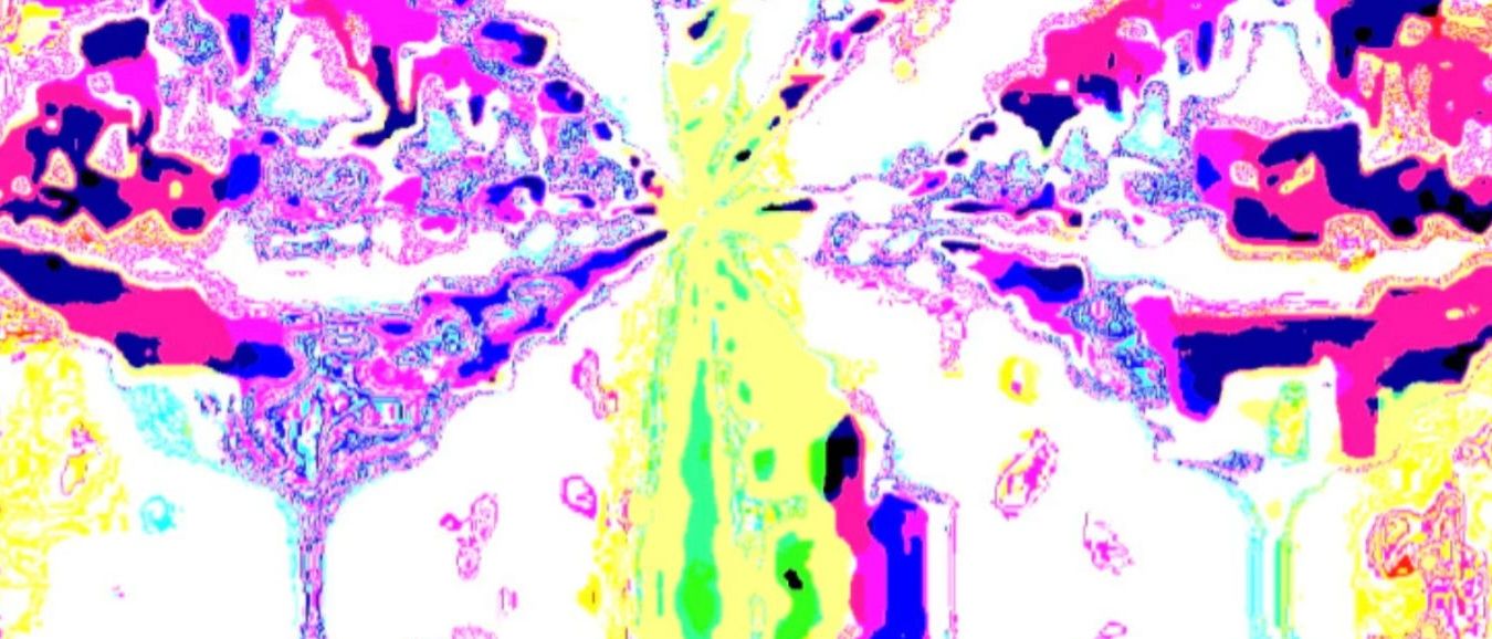 Colorful abstract pattern with vivid pink, yellow, green, and blue hues.