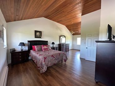 GVP Contracting Langley BC Interior Renovation Bedroom Remodel with new hardwood flooring and paint