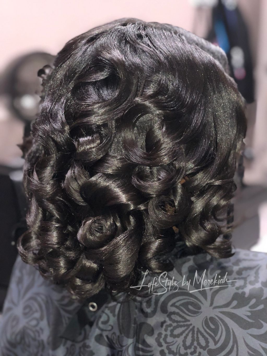 Relaxed hair, shampoo/style, curled with medium flat iron.