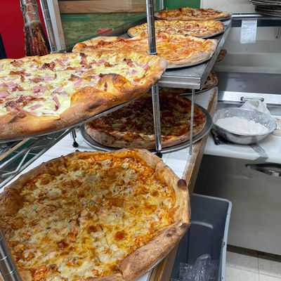 Pizza by the slice available North Hills Pizza Shop. Milanos Pizza