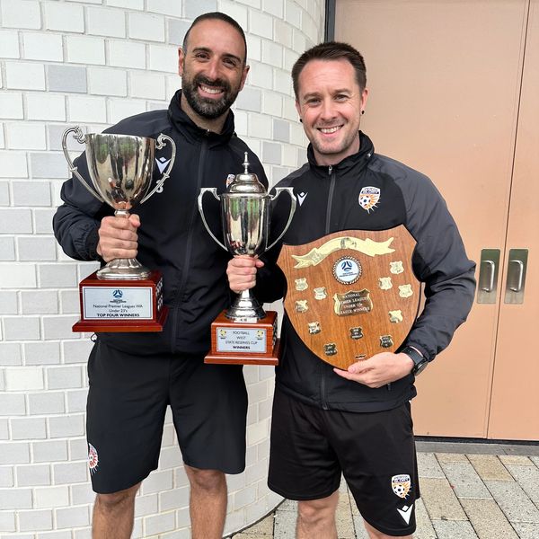 Francesco winning two trophies with Perth Glory Senior Academy