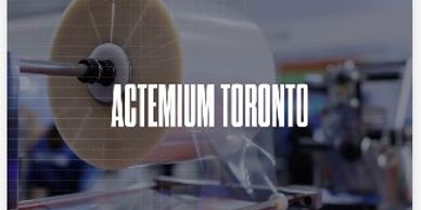 Roll of transparent film with 'ACTEMIUM TORONTO' text overlay.