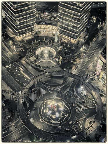 View from the Pearl tower restaurant down on the Lujiazui roundabout.