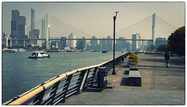 Walking by the river bank in Pudong area where we stay at our hotel.