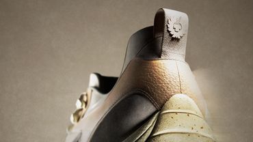 Close-up of a stylish, textured sneaker heel with unique detailing.