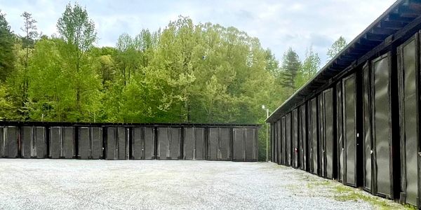 image of 12x36 indoor boat storage units surrounding rocky courtyard