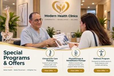 Chiropractor consulting patient at Modern Health Clinics.