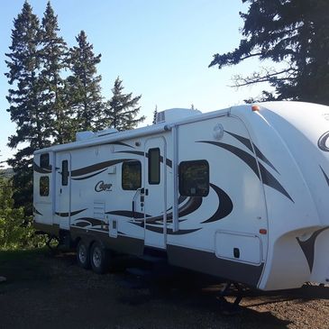 25 Camp sites in Ghost Lake Alberta. Camping with 30 Amp sites. Water and Sewer Calgary Cochrane AB