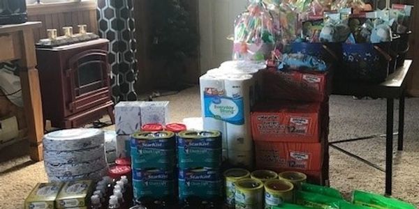 Donating food for struggling familes & easter baskets we made for children to St. Luke's Episcopal C