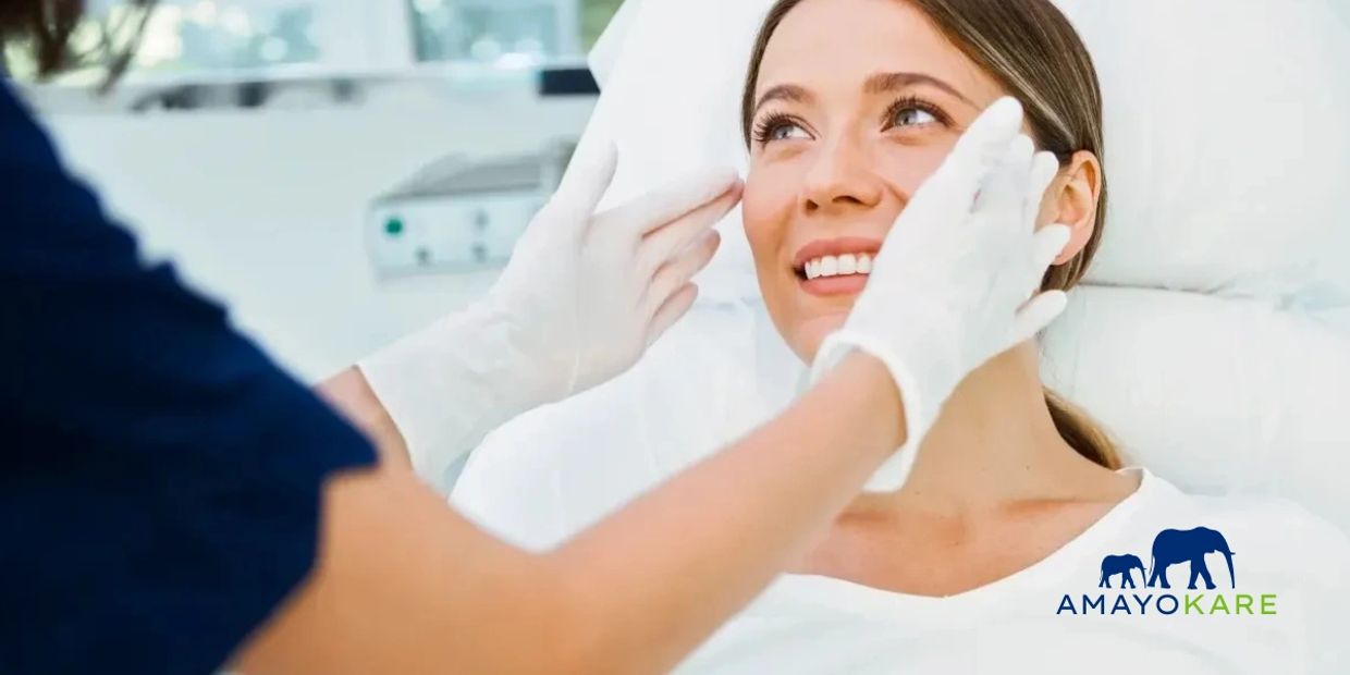 Woman receiving a facial treatment from a professional in a clinical setting.