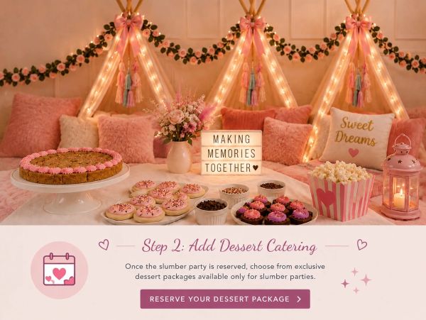 Cozy slumber party setup with desserts and warm lights.