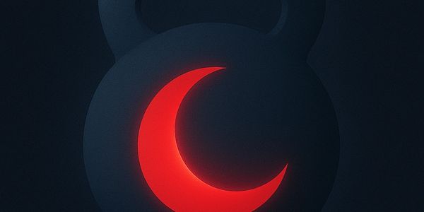 Black kettlebell with a glowing red crescent moon symbol.
